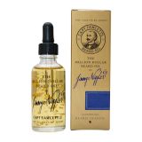 A bottle of Captain Fawcett "Jimmy Niggles" Million Dollar Beard Oil with dispensing pippette,