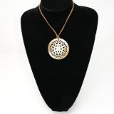 Round Carved Pale Horn Pendant