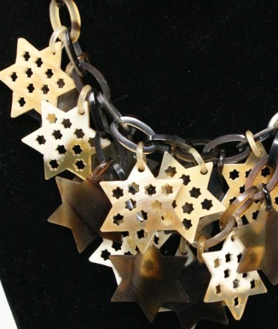 Spanish & Sisters Carved Stars necklace in pale oxhorn - Close Up