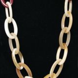 Rounded ovals horn necklace close up