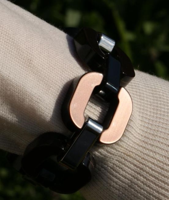 Wearing a Xavier Derome Brown / Metallic Reversible Bracelet