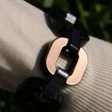 Wearing a Xavier Derome Brown / Metallic Reversible Bracelet